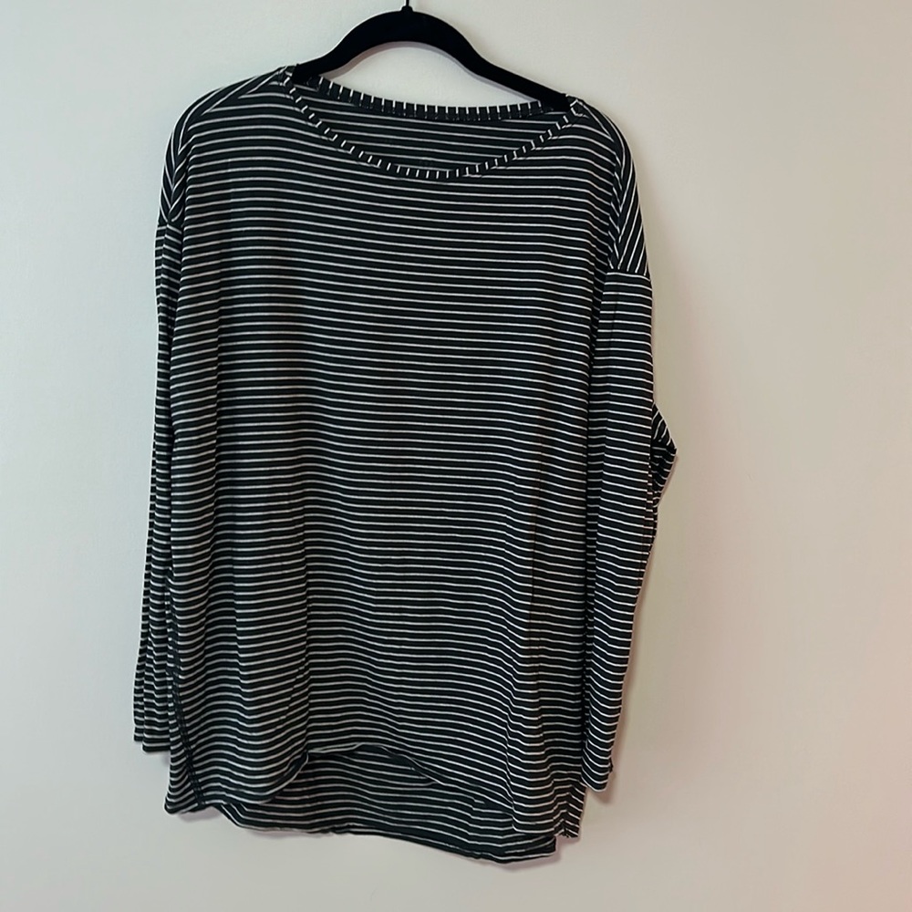 Size 12 back in action stripped long sleeve shirt lululemon. Great condition